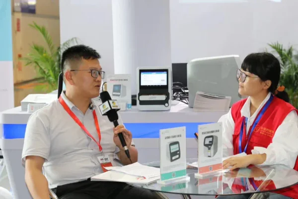 iSperm Medical team presenting fully automated CASA system and sperm quality analyzer at exhibition